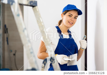 Portrait of builder in process of finishing work 108823128