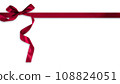 red color ribbon with red bow on top left corner, white background 108824051