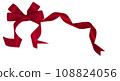 shiny red bow ribbon on top left corner, white background 108824056