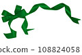 shiny green bow ribbon on top left corner, white background 108824058