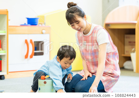 Nursery teachers and kindergarteners playing together. Photography cooperation: Ariake College of Education and Arts Nursery teachers and kindergarteners playing together. Photography cooperation: Ariake College of Education and Arts 108824443