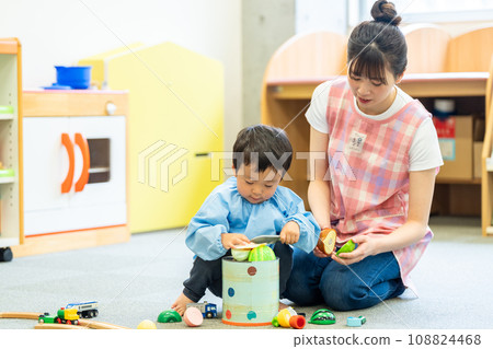 Nursery teachers and kindergarteners playing together. Photography cooperation: Ariake College of Education and Arts Nursery teachers and kindergarteners playing together. Photography cooperation: Ariake College of Education and Arts 108824468