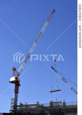 Construction site crane and blue sky 108824805
