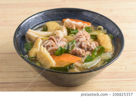 Warming pork soup with lots of ingredients Warming pork soup with lots of ingredients 108825357
