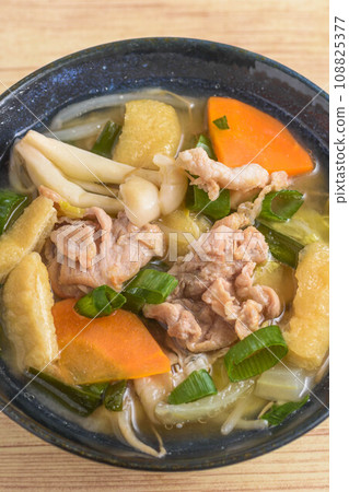 Warming pork soup with lots of ingredients 108825377