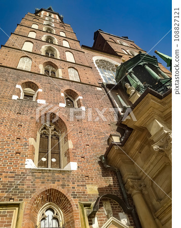 Krakow, Poland - Facade of the St. Mary's Church in the main square of Krakow, on a sunny day 108827121