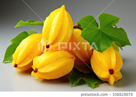Exotic carambola fruit on a light background Exotic carambola fruit on a light background 108828078