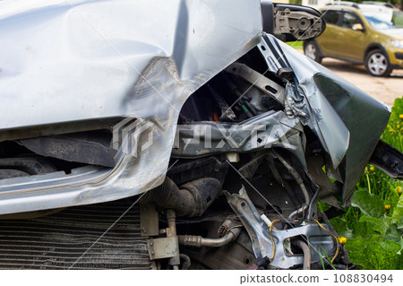silver car nose smashed in an accident at day time silver car nose smashed in an accident at day time 108830494