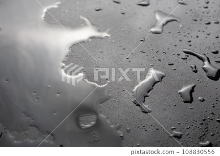 abstract background of wet black clean painted surface - close-up with selective focus abstract background of wet black clean painted surface - close-up with selective focus 108830556