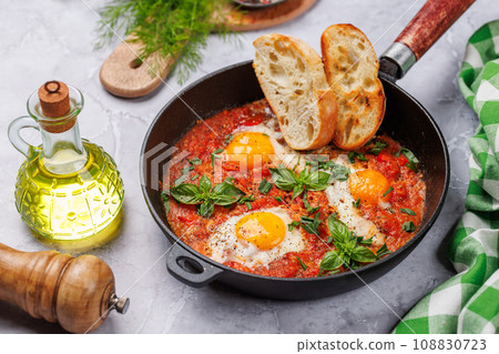 Delicious shakshuka breakfast in a pan Delicious shakshuka breakfast in a pan 108830723