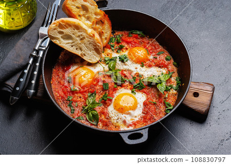 Delicious shakshuka breakfast in a pan Delicious shakshuka breakfast in a pan 108830797