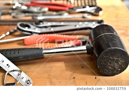 tools placed on a wooden board tools placed on a wooden board 108832759