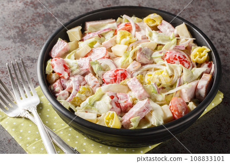 Grinder Salad or Italian Sub Salad closeup on the plate. Horizontal 108833101