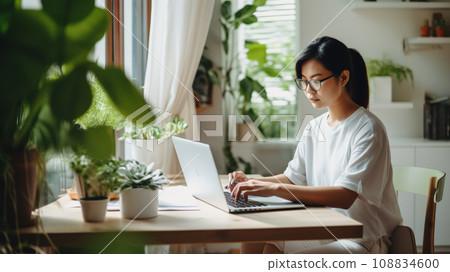 Asian female office worker doing telework 108834600