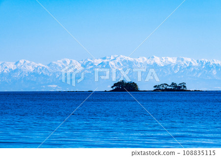 Tateyama mountain range across Toyama Bay (from Nadaura coast) Tateyama mountain range across Toyama Bay (from Nadaura coast) 108835115