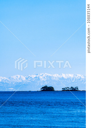 Tateyama mountain range across Toyama Bay (from Nadaura coast) Tateyama mountain range across Toyama Bay (from Nadaura coast) 108835144