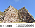 The stone walls of Takeda Castle ruins shine against the blue sky 108836069