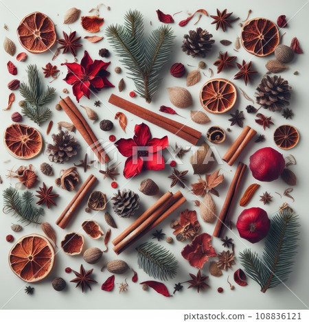 Christmas greeting card from scattered spruce twigs, red dry petals of fruit tree, golden fruits 108836121