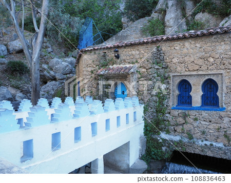 Stony building and white bridge over Ras El Maa waterfall in Chefchaouen, Morocco Stony building and white bridge over Ras El Maa waterfall in Chefchaouen, Morocco 108836463