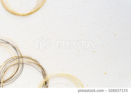 Background material of gold and black Mizuhiki on white fir Japanese paper 108837155
