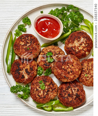 german frikadellen of ground meat on a plate 108837340