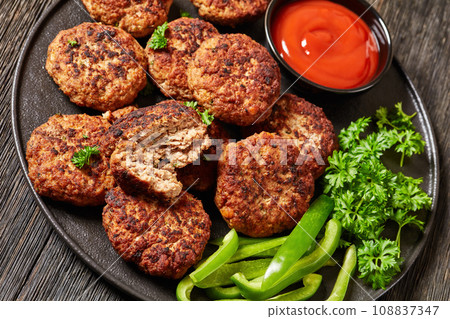 german frikadellen of ground meat on a plate 108837347