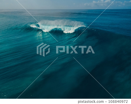 Perfect barrel wave in ocean. Aerial view of surfing swell 108840972