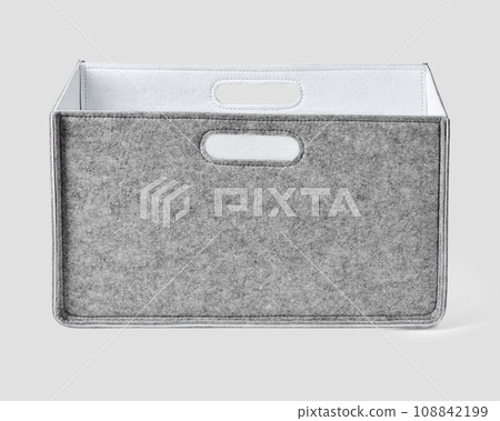 Artisan-crafted gray felt box with slotted handles for storing items Artisan-crafted gray felt box with slotted handles for storing items 108842199