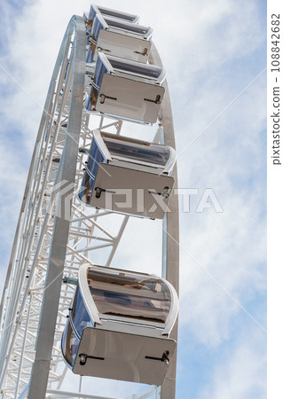 Big tall white ferris wheel in front of perfect blue sky in Bukovel. Carpathians Ukraine 108842682