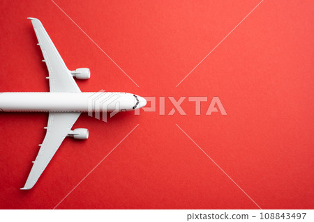 The front of the aircraft, top view. Airplane arrival. Passenger transportation. Business and tourism. Airline. World communication and commercial flights. Place for text. Arrival and departure. 108843497