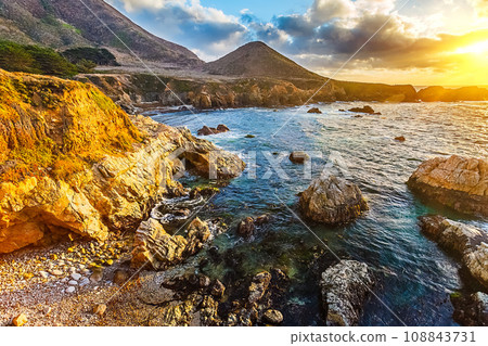 Big Sur rocks at sunset 108843731