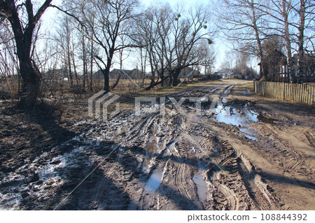 Dirt and traces of protectors of different kinds of transport in village Dirt and traces of protectors of different kinds of transport in village 108844392