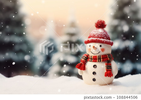 Cute little snowman in knitted hat and scarf standing outside on a winters day Cute little snowman in knitted hat and scarf standing outside on a winters day 108844506