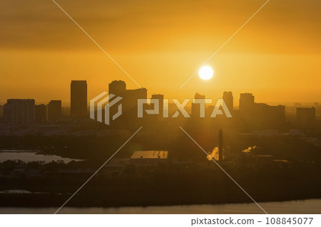 View from above of contemporary high skyscraper buildings in downtown district of Tampa city in Florida, USA at sunset. American megapolis with business financial district View from above of contemporary high skyscraper buildings in downtown district of Tampa city in Florida, USA at sunset. American megapolis with business financial district 108845077