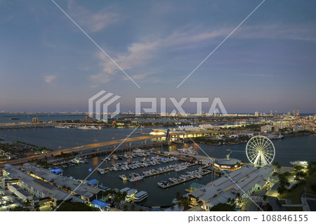 Luxury yachts docked in Biscayne Bay harbor in downtown district of Miami city in Florida, USA 108846155