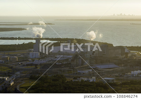 Industrial facility for chemical production of phosphoric acid polluting atmosphere with toxic emissions. Mosaic Riverview Plant in Tampa, Florida. Factory for handling and processing of phosphates 108846274