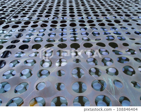 Hole patterns let in the light going upward 108846404