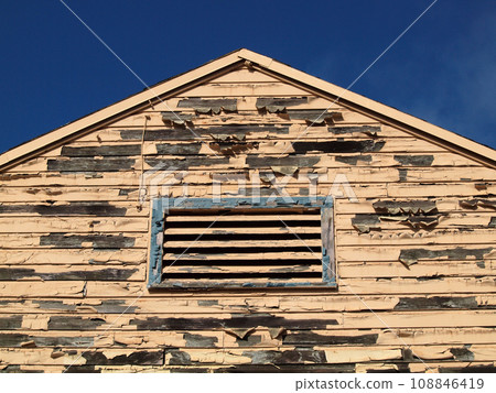 Paint chips on Building 108846419