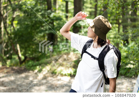Young man enjoying a hike 108847020