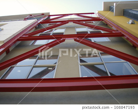 Looking up at Fancy Modern Apartment building 108847193