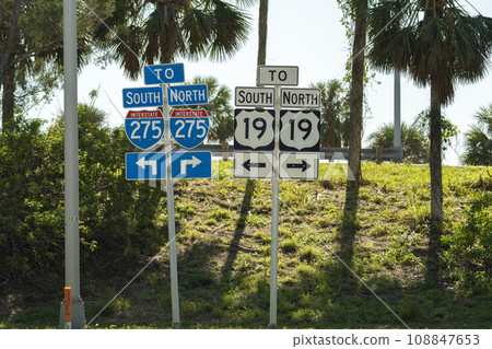 Blue directional road sign indicating direction to I-275 freeway interstate highway serving the Tampa Bay area in Florida 108847653