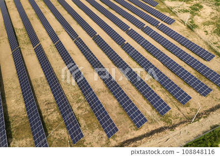Aerial view of solar power plant. Electric panels for producing clean ecologic energy. Aerial view of solar power plant. Electric panels for producing clean ecologic energy. 108848116