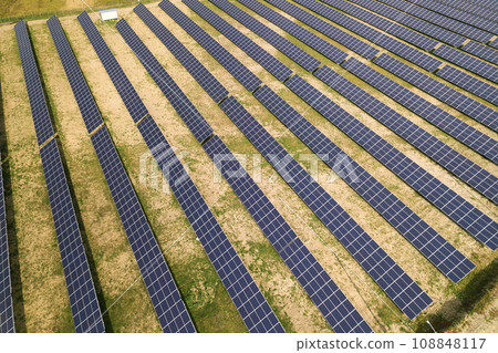Aerial view of solar power plant. Electric panels for producing clean ecologic energy. 108848117