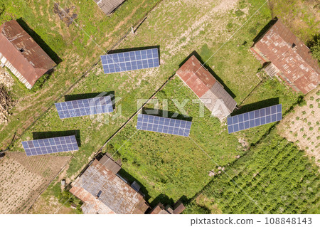 Aerial view of solar panels in rural country area. 108848143