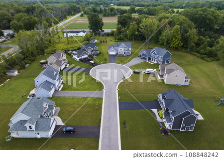 Aerial view of large private homes in Rochester, NY residential area. New family houses as example of real estate development in american suburbs 108848242
