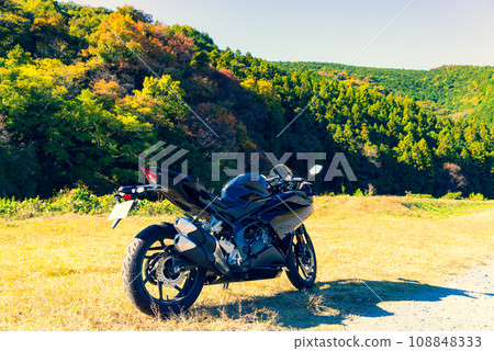 Autumn bike touring Colorful natural background of Satoyama e-4 Emphasis on warm colors and cool colors Autumn bike touring Colorful natural background of Satoyama e-4 Emphasis on warm colors and cool colors 108848333