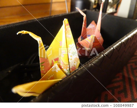 Two folding cranes 108849987