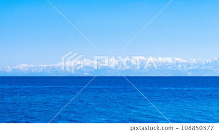 Tateyama mountain range across Toyama Bay (from Nadaura coast) Tateyama mountain range across Toyama Bay (from Nadaura coast) 108850377