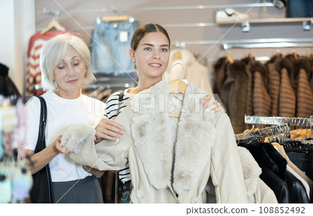 Shoppers take their time examining 108852492