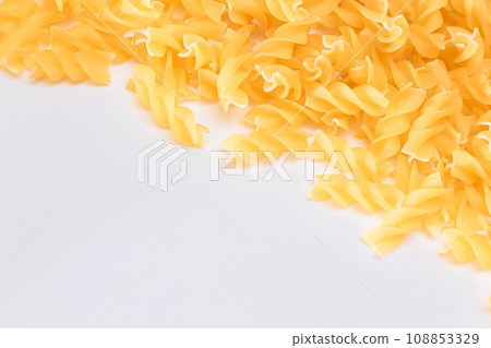 Uncooked Fusilli Pasta with Copy Space Uncooked Fusilli Pasta with Copy Space 108853329